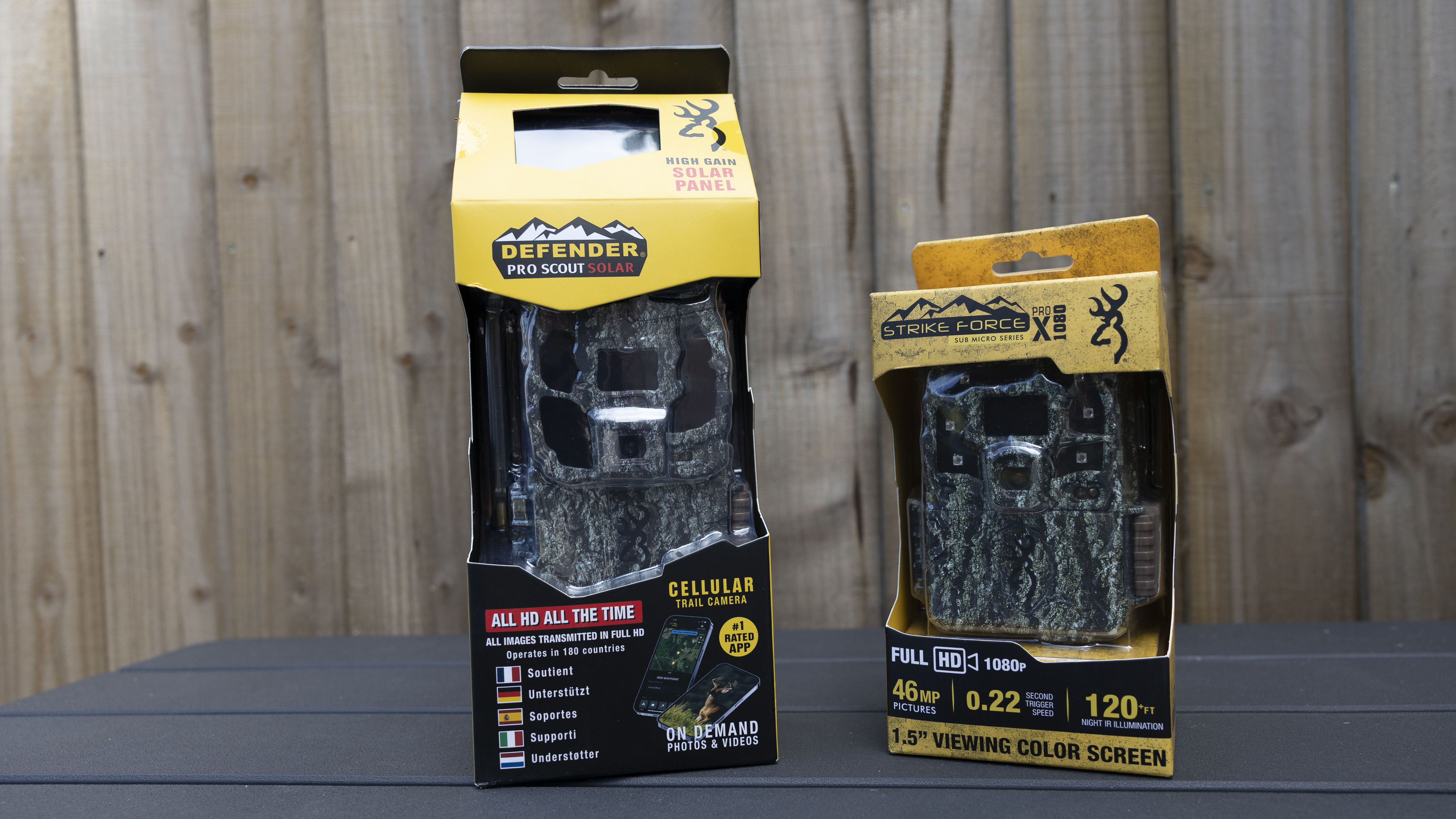The Browning Defender Pro Scout Max Solar in its box next to the Strike Force Pro HD