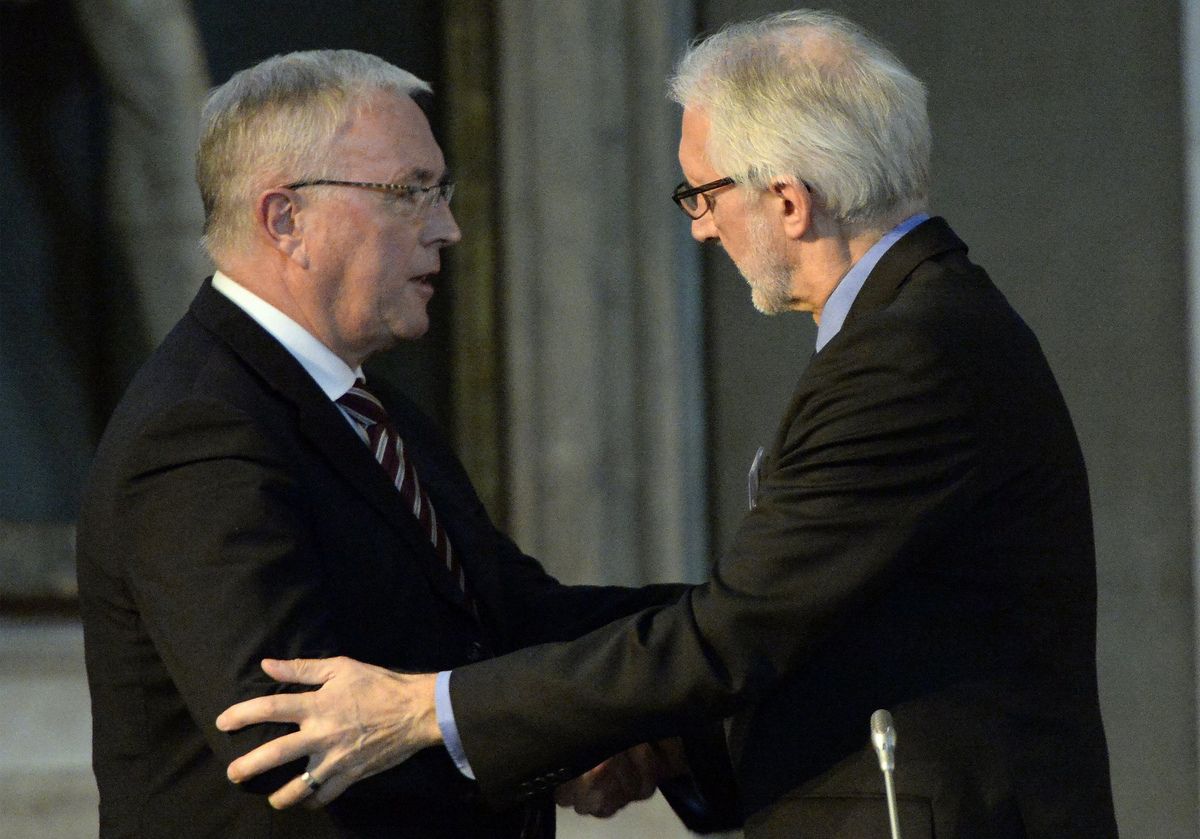 Pat McQuaid with Brian Cookson at the 2013 UCI Presidential elections in Florence
