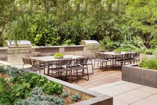 outdoor terrace seating surrounded by greenery