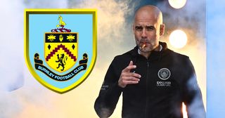 Manchester City's Spanish manager Pep Guardiola smokes a cigar as he attends an event for fans with members of the Manchester City football team following an open-top bus parade through Manchester, north-west England on May 23, 2022, to celebrate winning the 2021-22 Premier League title.