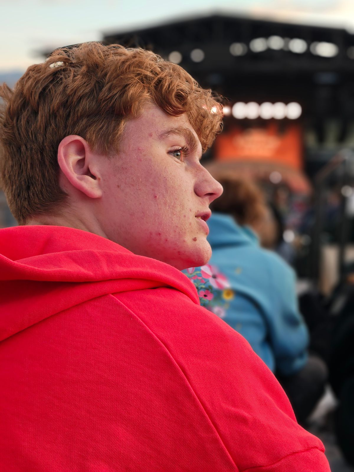 Portrait photos of a family at a restaurant and outdoor concert