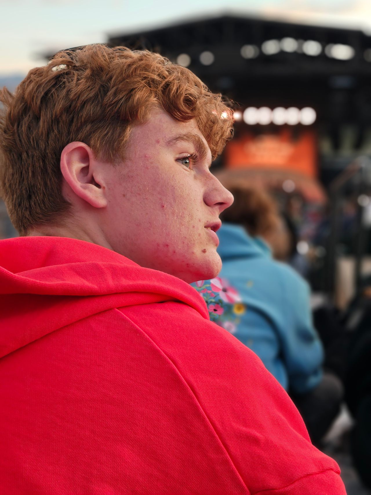 Portrait photos of a family at a restaurant and outdoor concert