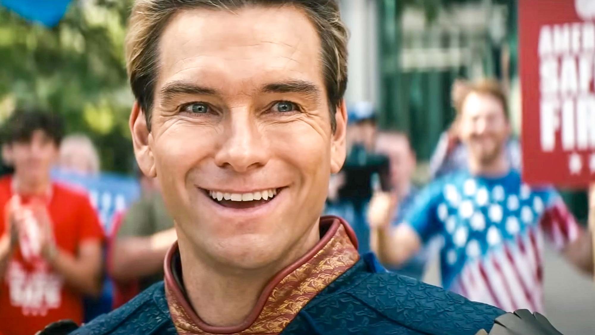 Antony Starr as Homelander, smiles uneasily, in The Boys