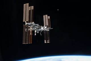 The International Space Station in orbit around Earth.