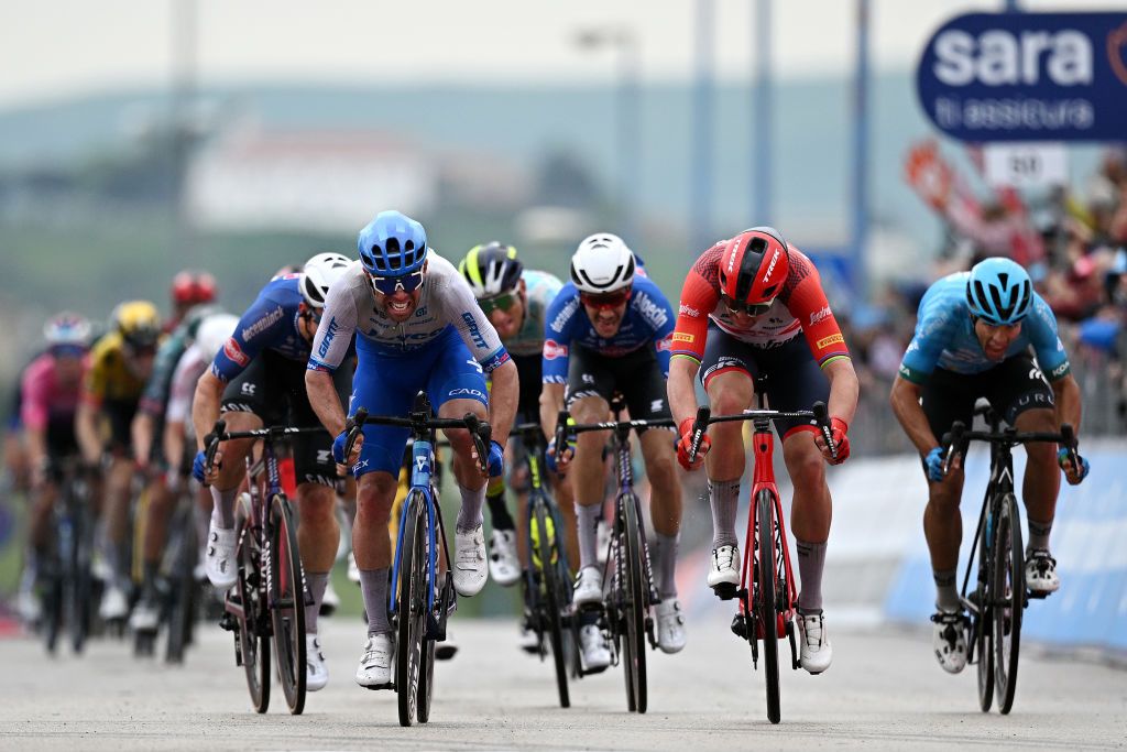 MELFI ITALY MAY 08 EDITORS NOTE Alternate crop LR Michael Matthews of Australia and Team Jayco AlUla and Mads Pedersen of Denmark and Team Trek Segafredo sprint at finish line during the 106th Giro dItalia 2023 Stage 3 a 213km stage from Vasto to Melfi 532m UCIWT on May 08 2023 in Melfi Italy Photo by Stuart FranklinGetty Images