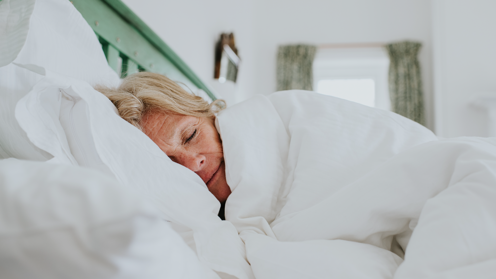 Woman sleeping in bed