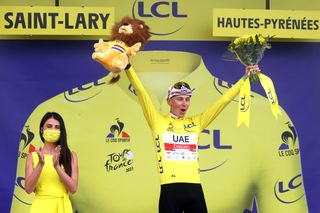 SAINTLARYSOULAN COL DU PORTET FRANCE JULY 14 Tadej Pogaar of Slovenia and UAETeam Emirates Yellow Leader Jersey celebrates at podium during the 108th Tour de France 2021 Stage 17 a 1784km stage from Muret to SaintLarySoulan Col du Portet 2215m LeTour TDF2021 on July 14 2021 in SaintLarySoulan Col du Portet France Photo by Michael SteeleGetty Images