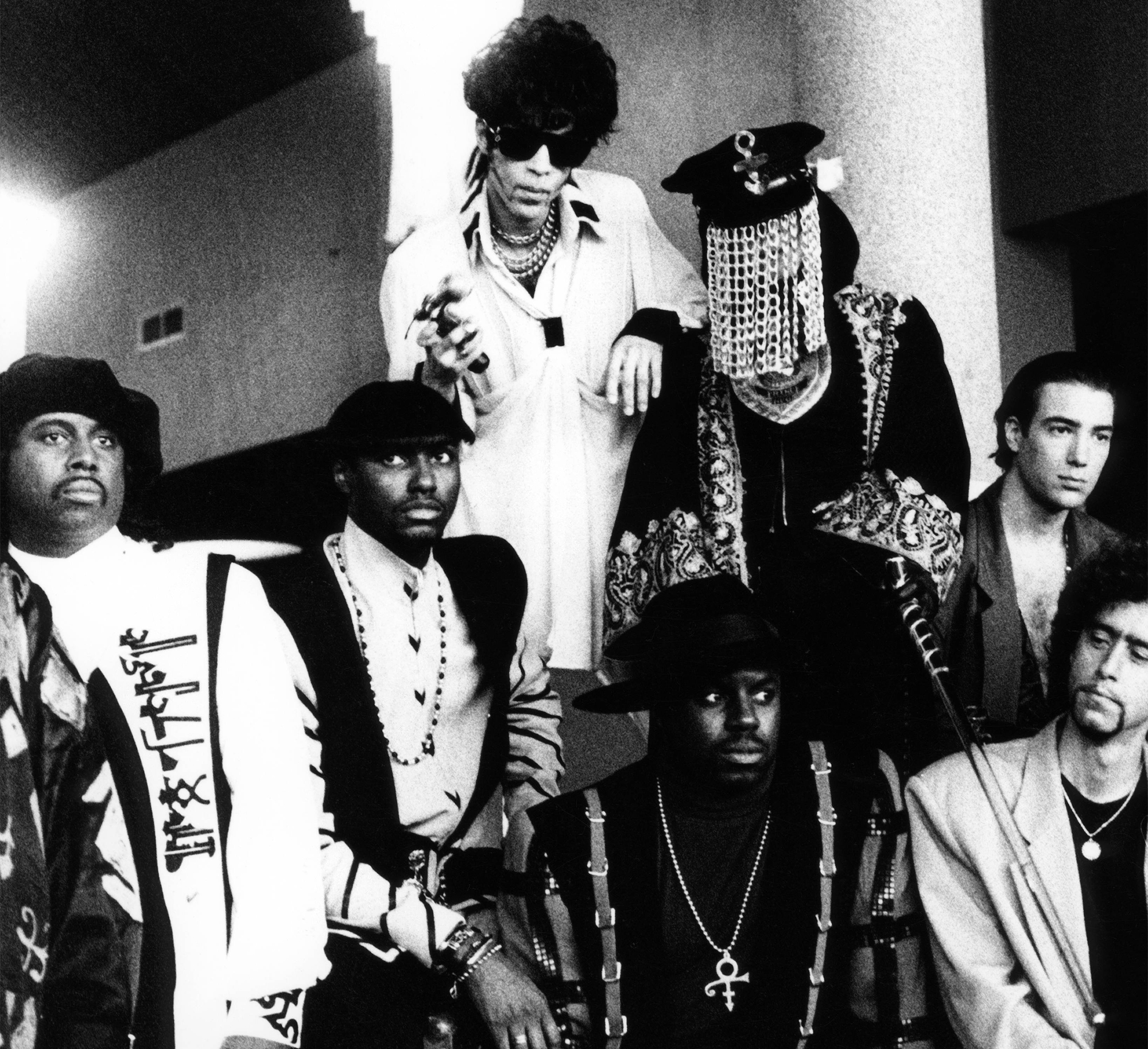 Posed group portrait of Prince (back row, centre) &amp;amp; the New Power Generation in 1994