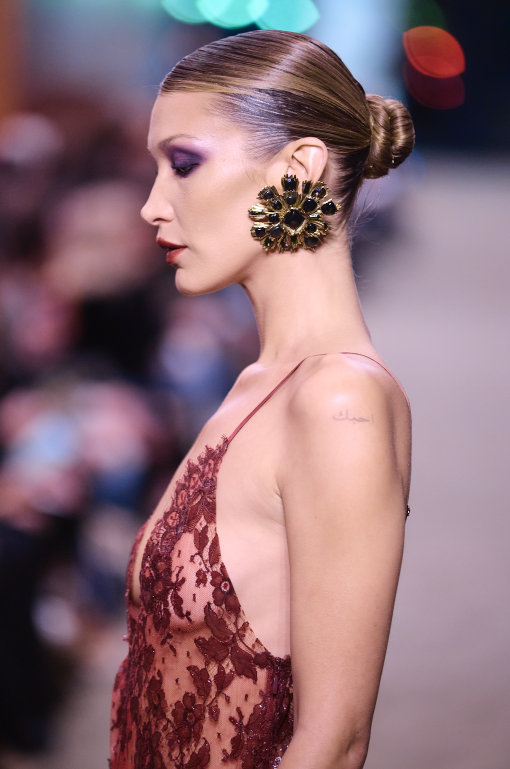 Bella Hadid returned to Saint Laurent's runway in a lingerie-inspired, Fall 2026 lace skirt set