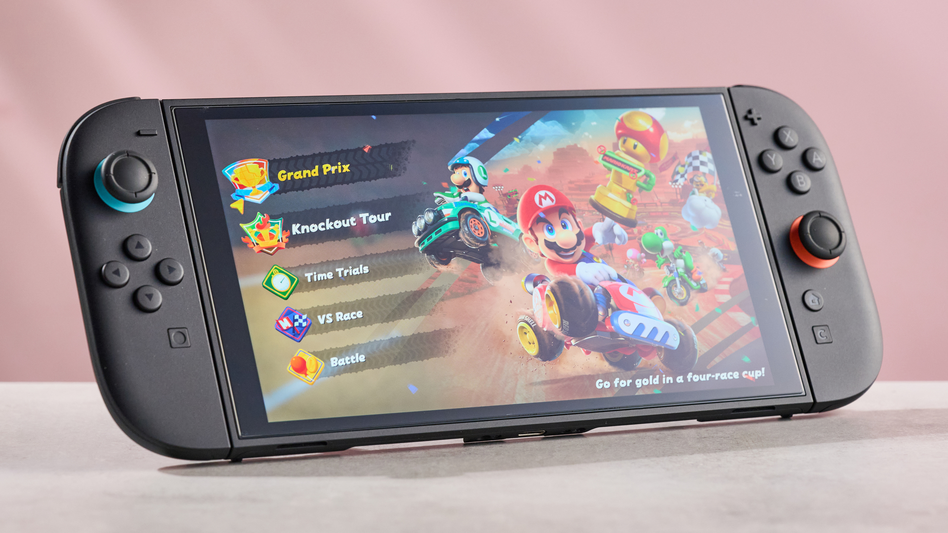 The Nintendo Switch 2 with the Belkin Tempered Glass Anti-Reflective Screen Protector applied; Mario Kart World is displayed on screen with bright, vibrant colors.