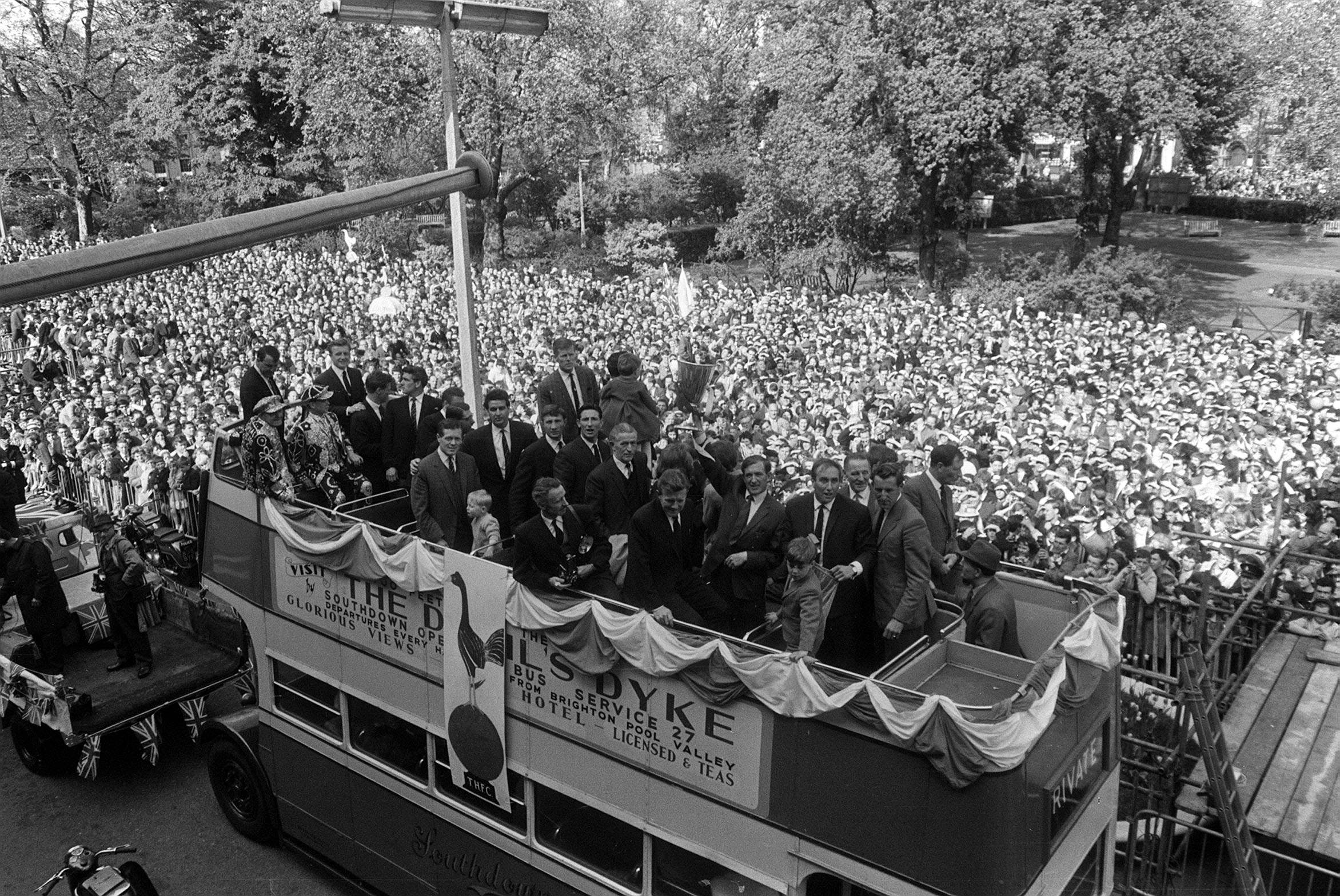 Tottenham players celebrate their European Cup Winners' Cup win on a parade after beating Atletico Madrid 5-1 in the final in Rotterdam in May 1963.