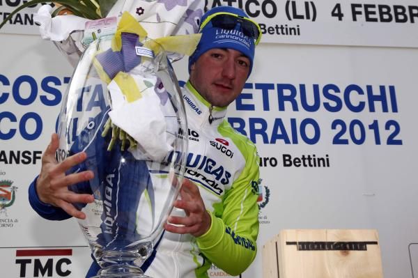 Elia Viviani (Liquigas-Cannondale) celebrates on the podium.