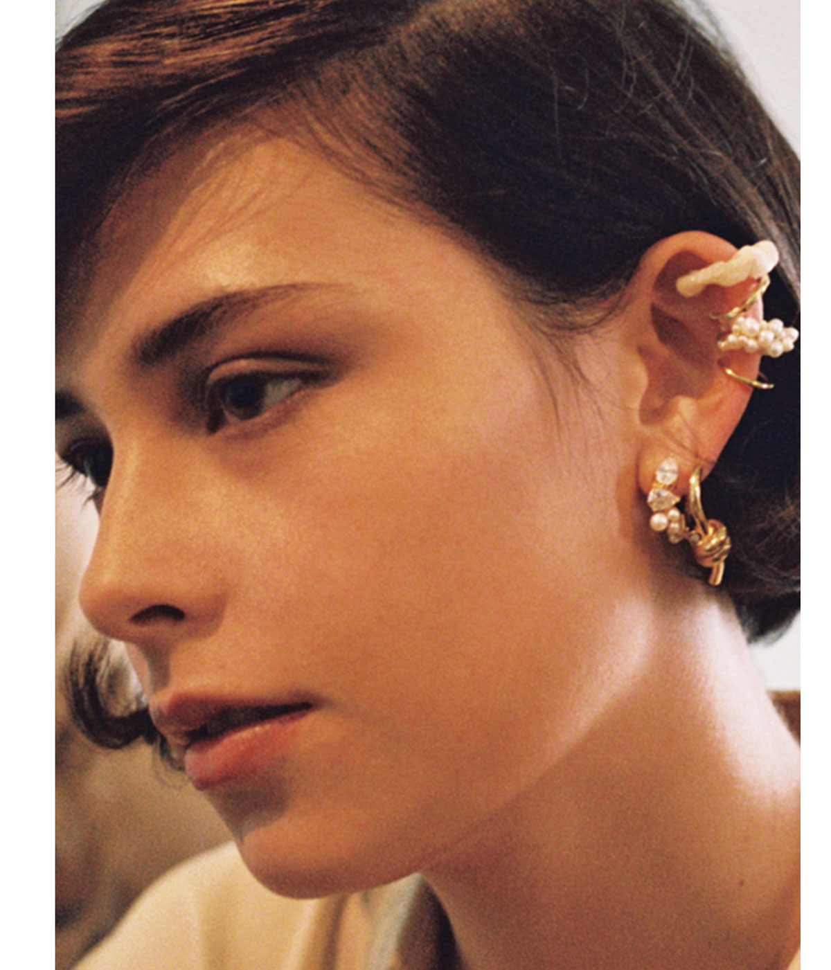 woman wearing Completedworks jewellery