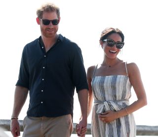 FRASER ISLAND, AUSTRALIA - OCTOBER 22: Prince Harry, Duke of Sussex and Meghan, Duchess of Sussex walking along Kingfisher bay walk about on October 22, 2018 in Fraser Island, Australia. The Duke and Duchess of Sussex are on their official 16-day Autumn tour visiting cities in Australia, Fiji, Tonga and New Zealand. (Photo by Chris Hyde/Getty Images)