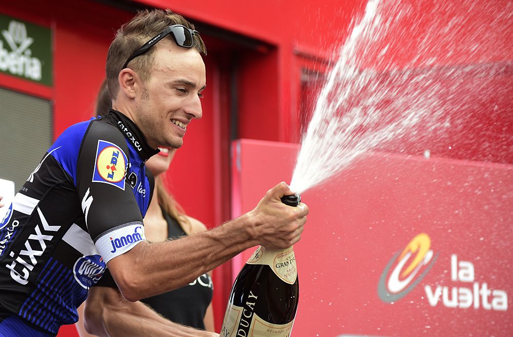 Gianluca Brambilla (Etixx-QuickStep) celebrates his stage 15 victory on the podium at the Vuelta a Espana