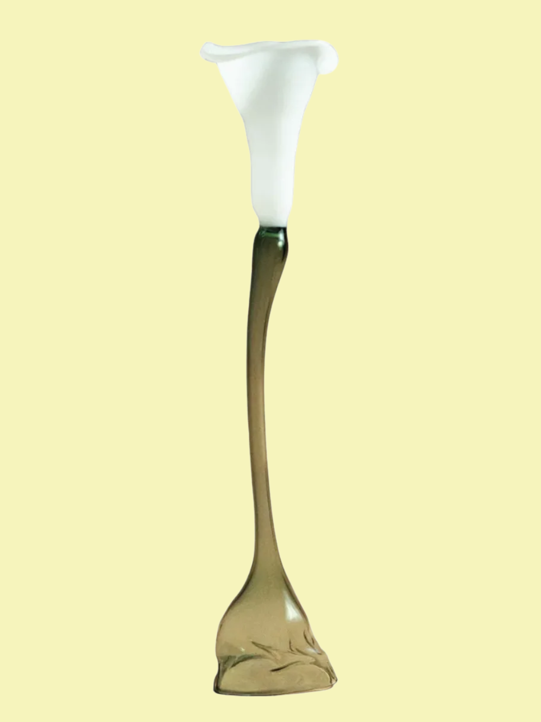 A glass calla lily shaped candle holder from La Bermeja