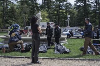 A photo of Sofia Falcone from The Penguin in black leather pants and boots