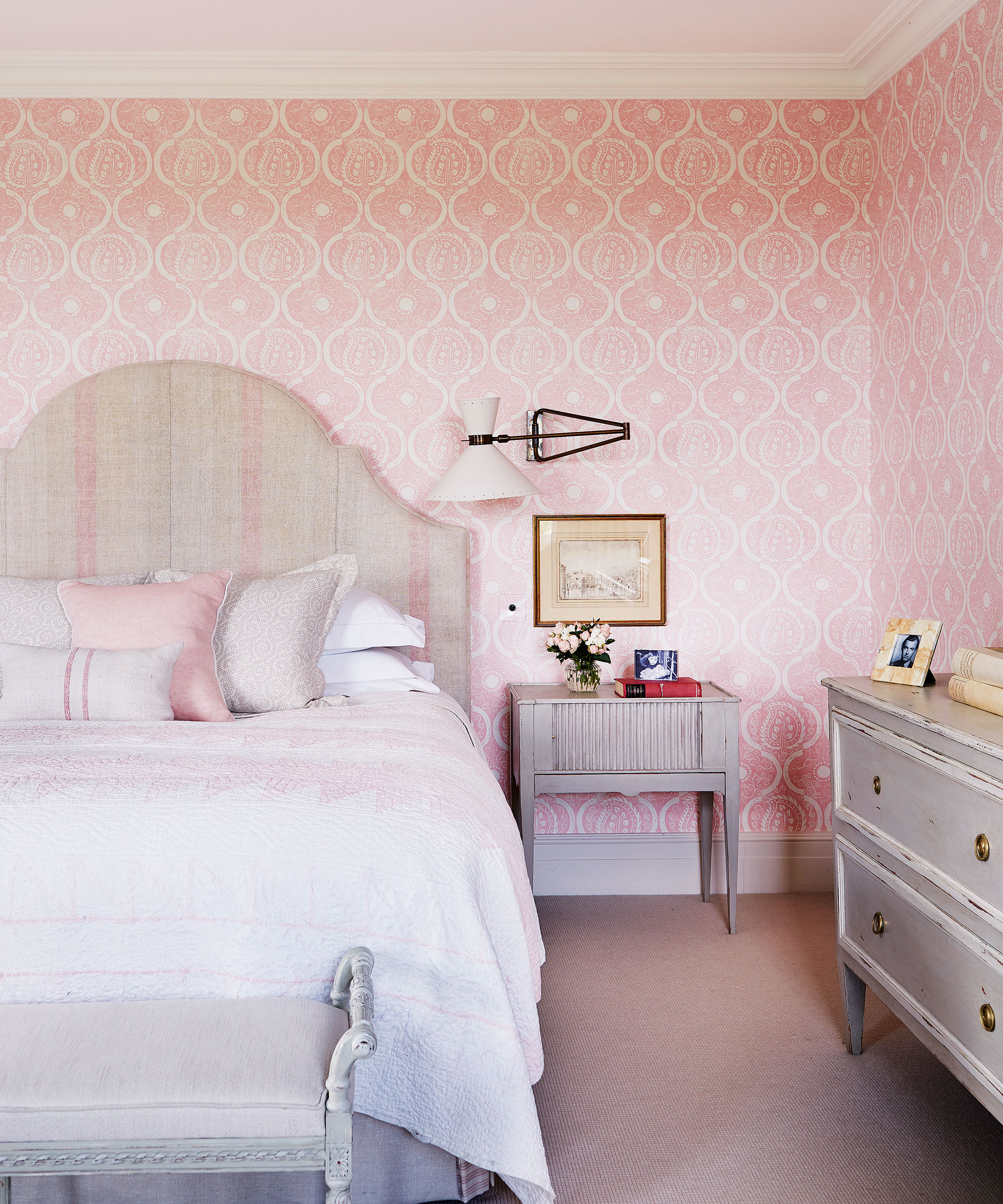 girly boudoir with pink patterned wallpaper