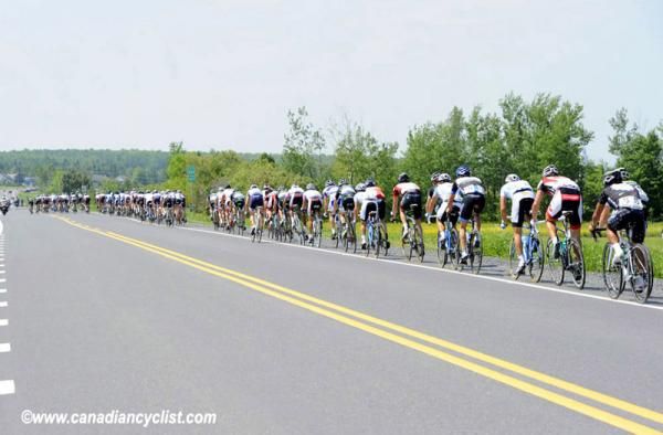 The peloton strings out as it gets into the countryside