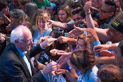 Bernie Sanders greets supporters.