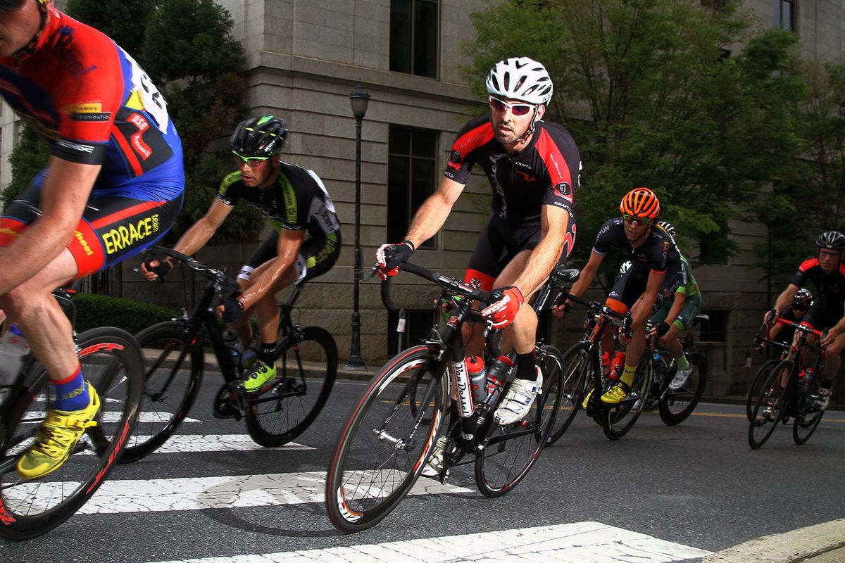 Van Dessels Gui Nelessen is off the saddle on Eighth Street Hill.