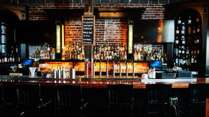 Interior of empty bar at night