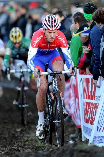 Dutch champion Lars Boom powers through the mud in Leuven.