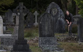 Grave Digger Alan Munnery at the Brookwood Cemetery, Surrey