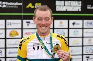 Rohan Dennis (Jumbo-Visma) in the green and gold 