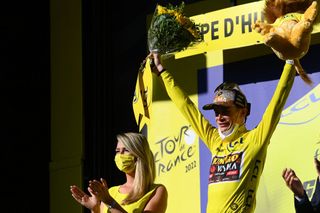 ALPE DHUEZ FRANCE JULY 14 Jonas Vingegaard Rasmussen of Denmark and Team Jumbo Visma celebrates winning the Yellow Leader Jersey on the podium ceremony after the 109th Tour de France 2022 Stage 12 a 1651km stage from Brianon to LAlpe dHuez 1471m TDF2022 WorldTour on July 14 2022 in Alpe dHuez France Photo by Tim de WaeleGetty Images