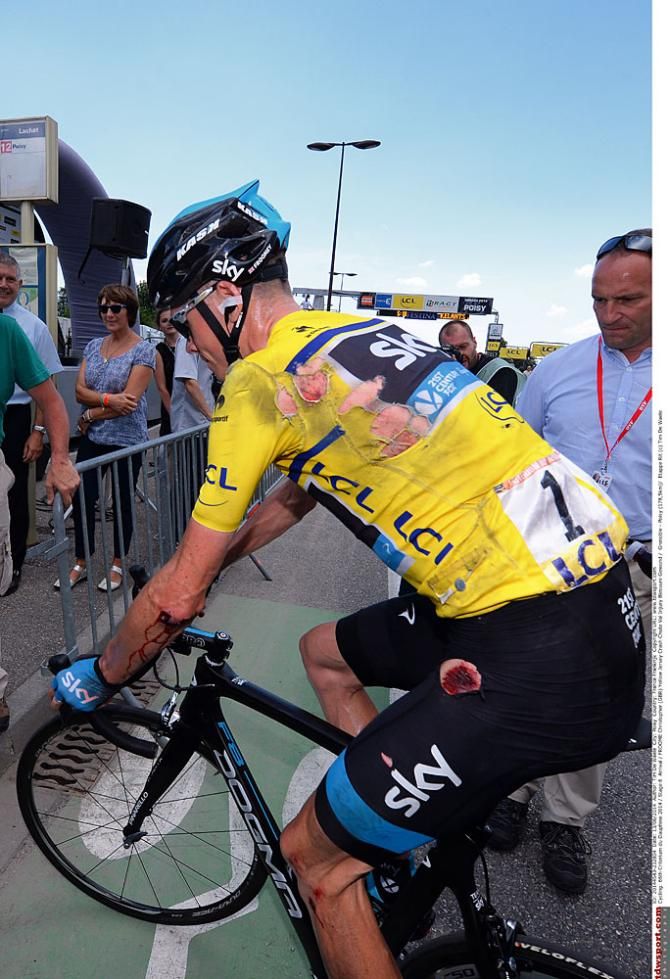 Chris Froome's jersey was all torn after his crash