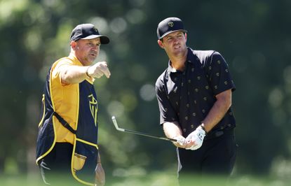 Mito Pereira and caddie Scott McGuinness