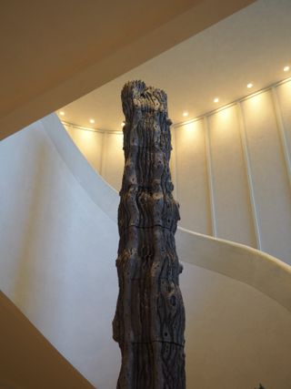 Tree-shaped ceramic sculpture in the resort’s central staircase