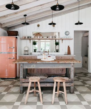 Leo Cottage kitchen with shiplap paneling, rustic work bench island and retro fridge