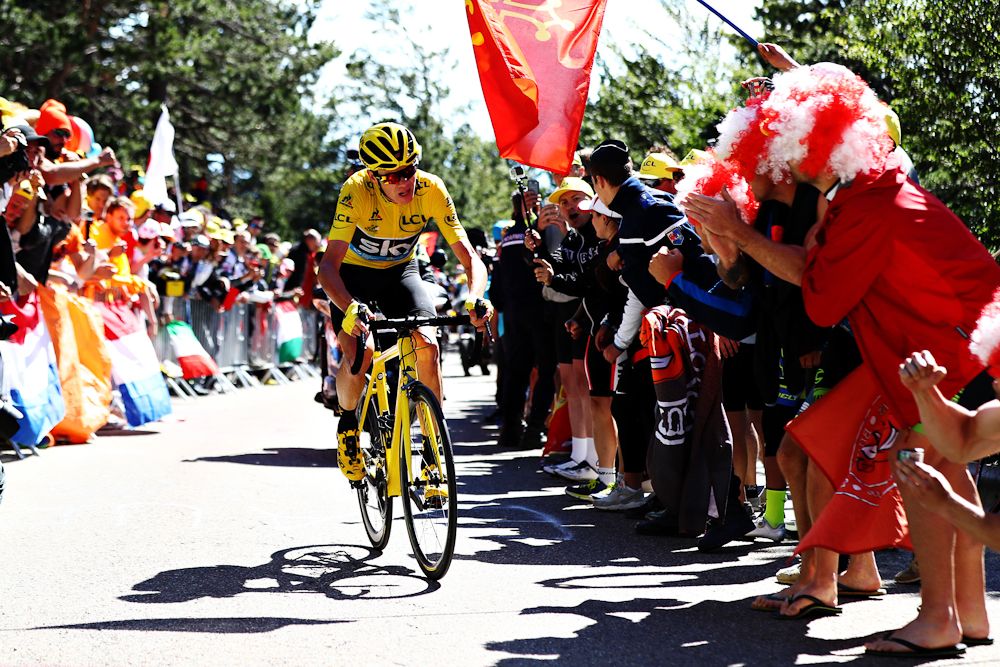 Chris Froome rides a Mavic neutral support bike toward the finish of stage 12