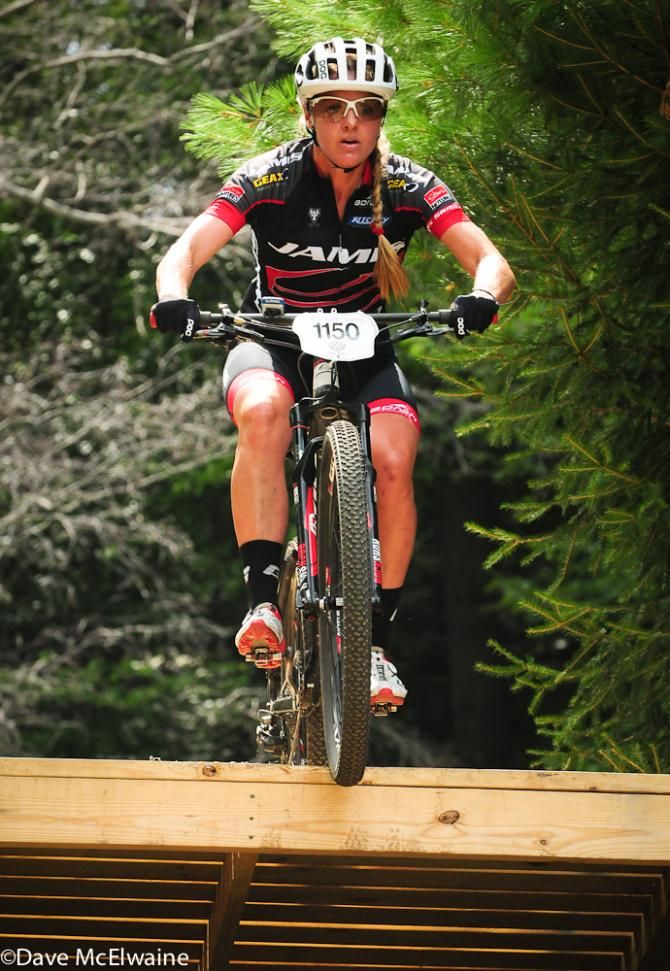 Erica Tingey (Team Jamis) flying off one of the jumps on lap one