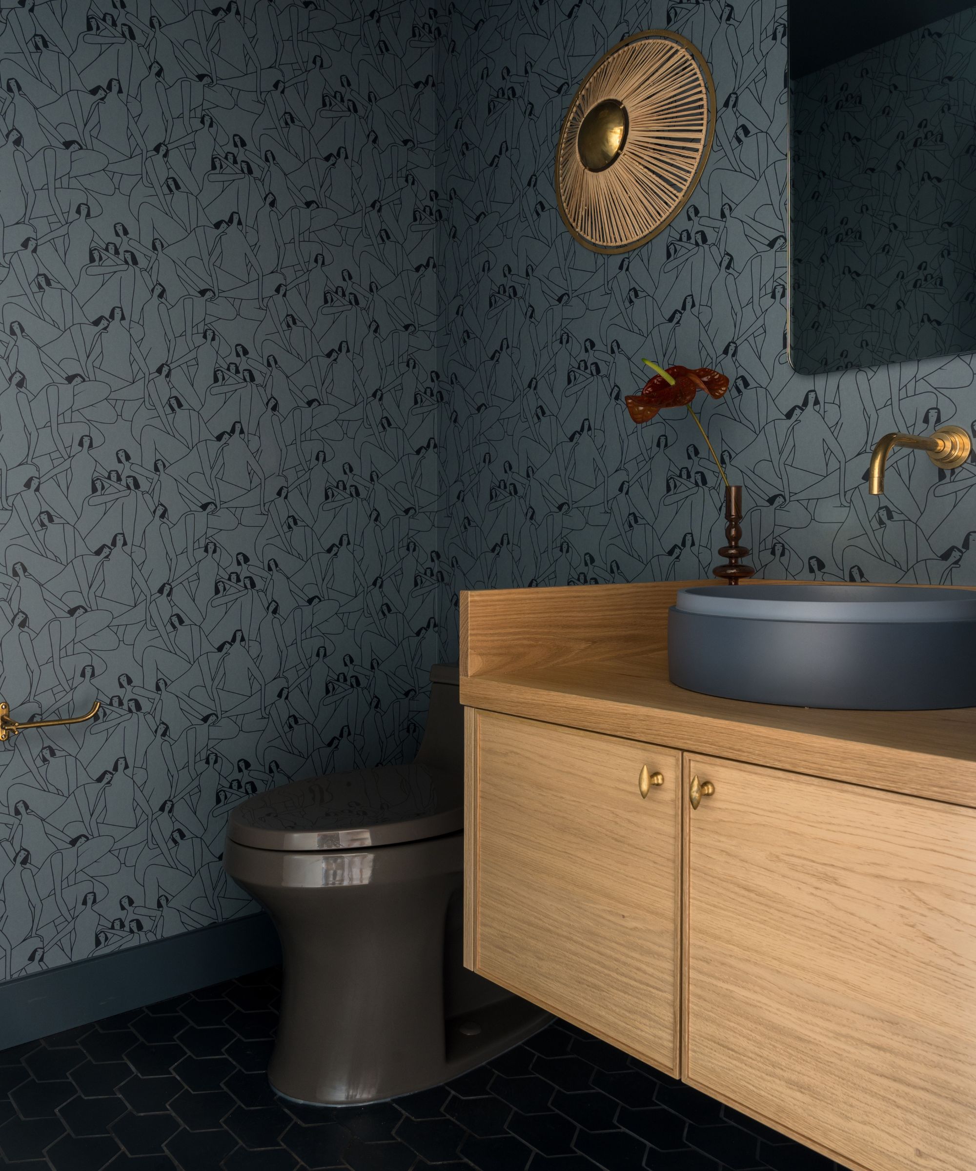 blue bathroom with modern wallpaper
