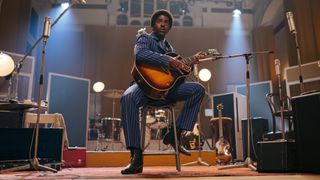 The Doctor (Ncuti Gatwa) with a guitar in Abbey Road Studios in Doctor Who season 14 episode 2