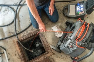 a cctv camera being used in a drainage survey