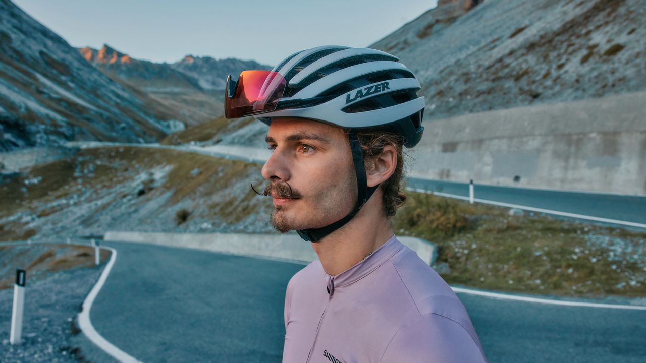 Man wearing Lazer Z1 helmet with sunglasses