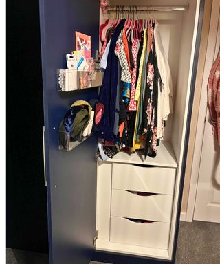 My open closet with a single hanging rail and drawers underneath. There is no vertical space for long dresses