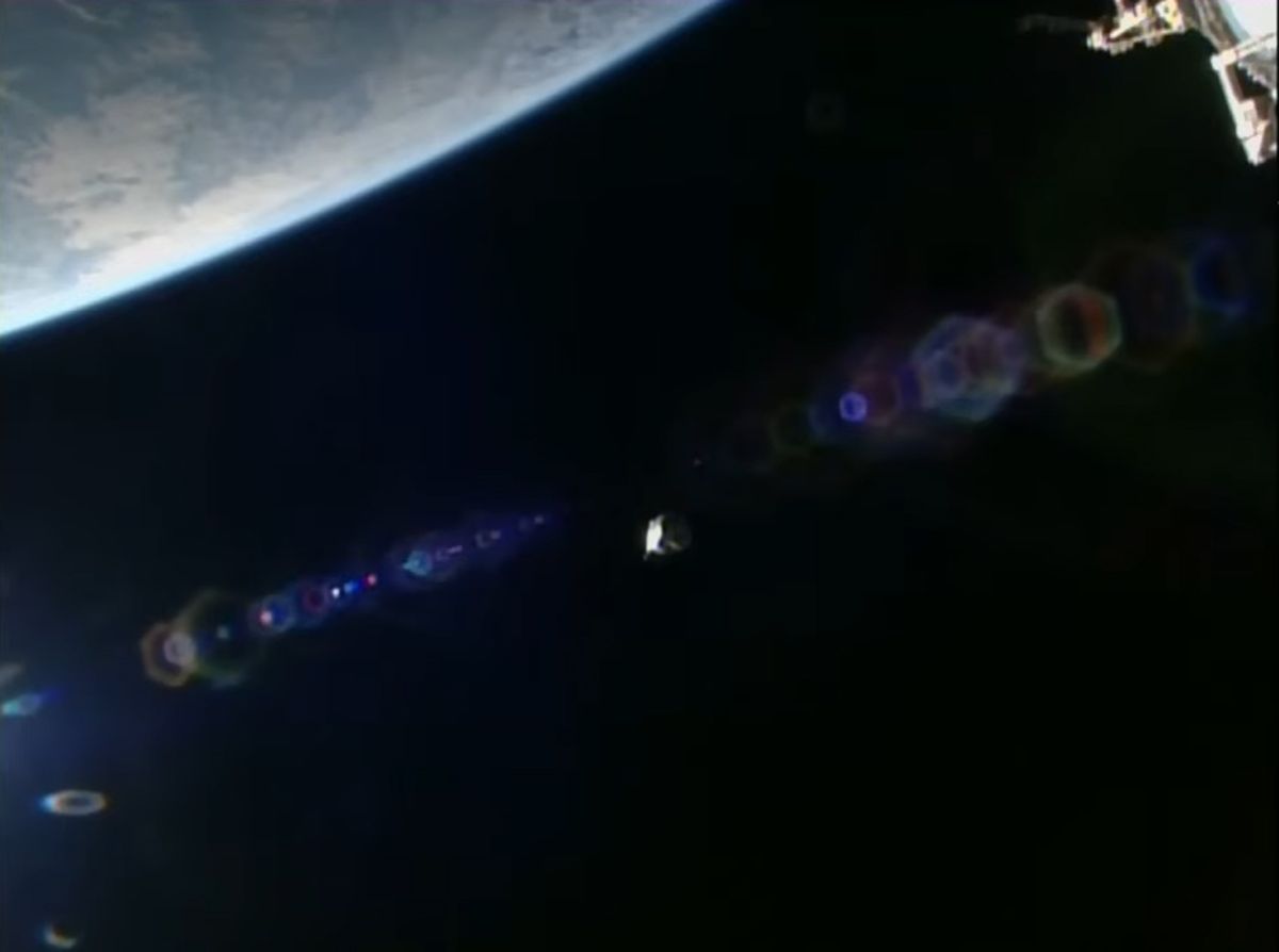 The SpaceX Dragon CRS-25 spacecraft departs the International Space Station during orbital sunrise.