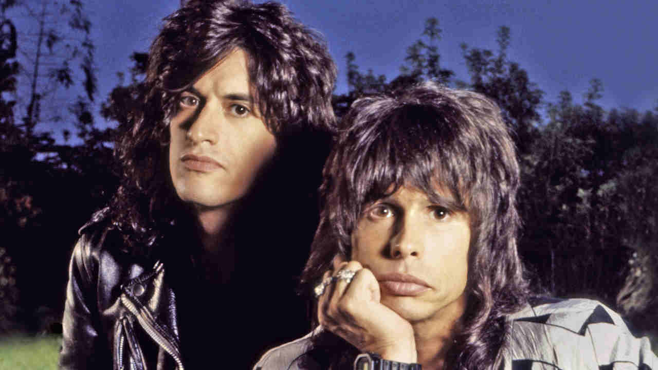 Aerosmith’s Joe Perry and Steven Tyler posing for a photograph in 1989