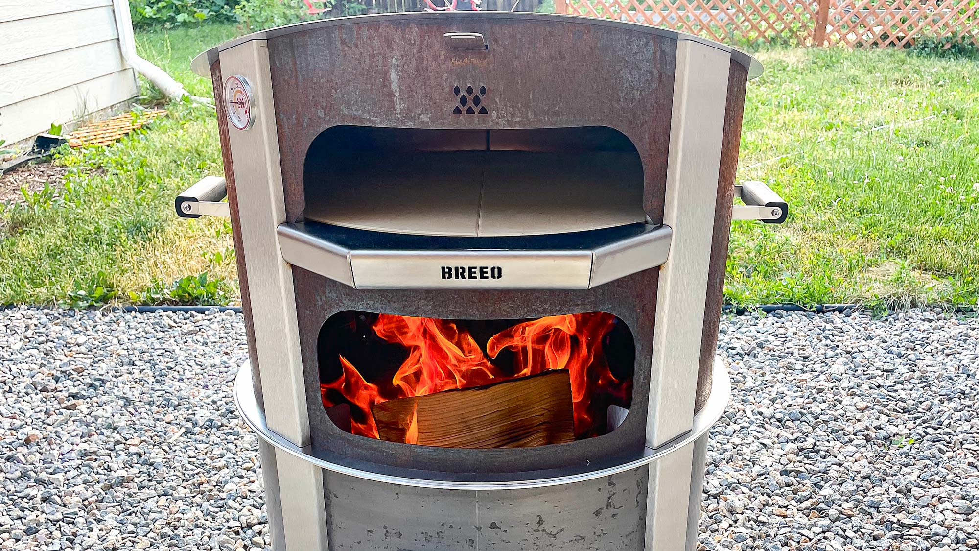 Breeo Live-fire pizza oven bundle in back yard