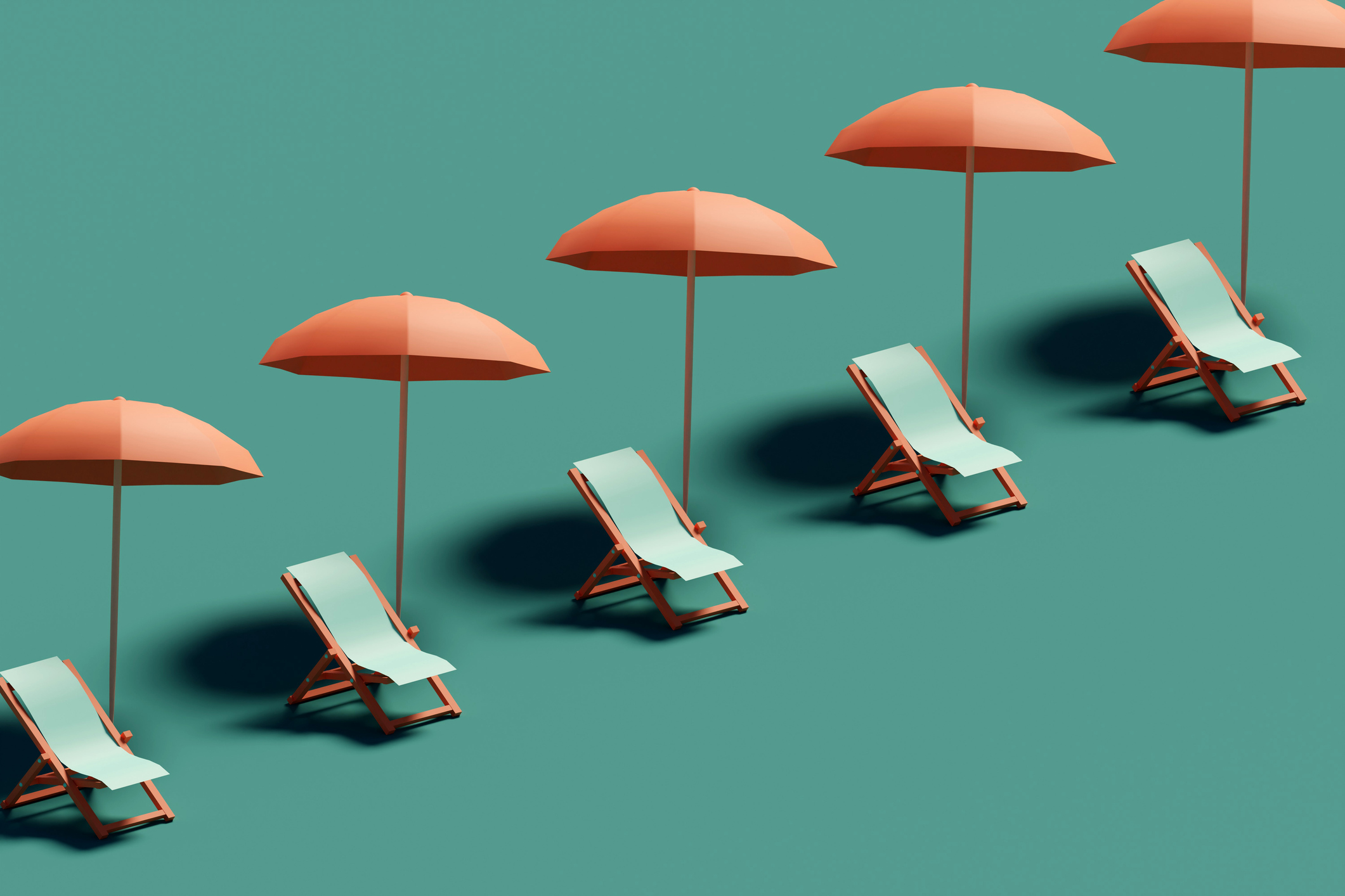 row of five beach chair under orange umbrellas