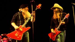 Dusty Hill (left) and Billy Gibbons, both of the group ZZ Top, perform onstage at the Poplar Creek Music Theater, Hoffman Estates, Illinois, September 9, 1983.