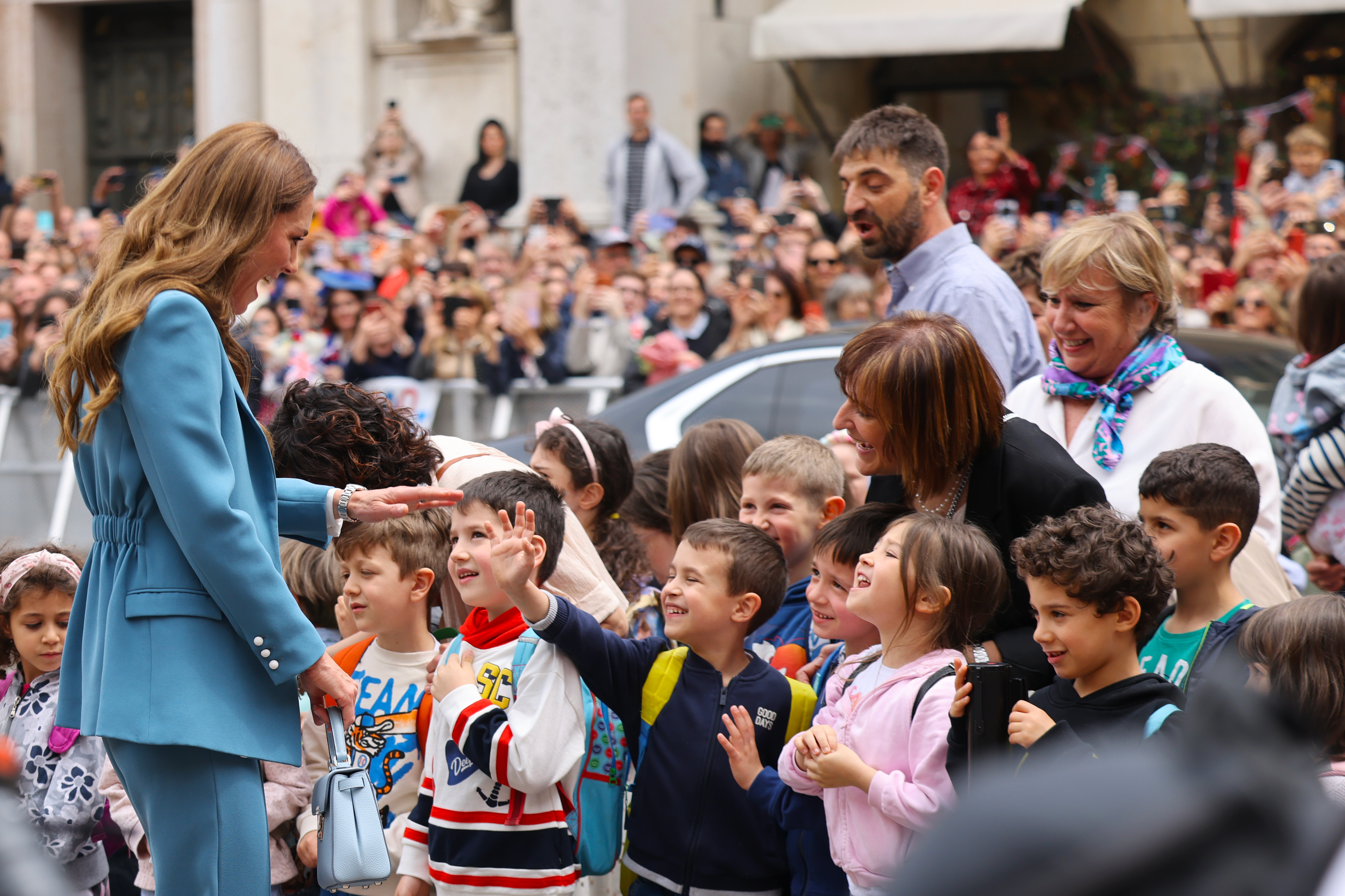 Princess Kate meeting kids in Italy