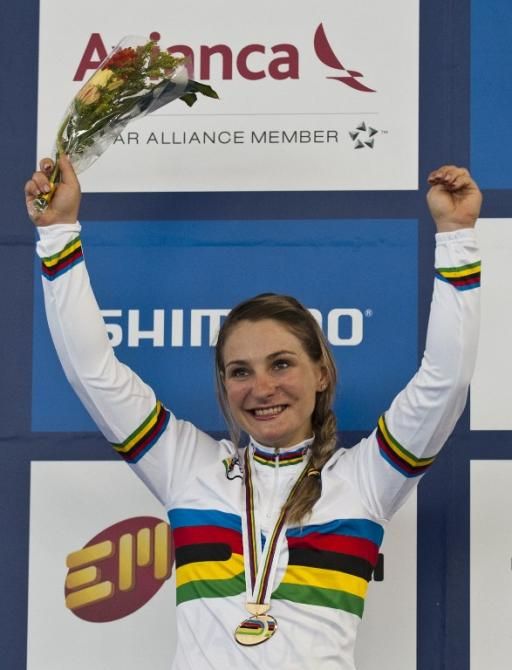 Kristina Vogel collecting her third rainbow jersey of the championships