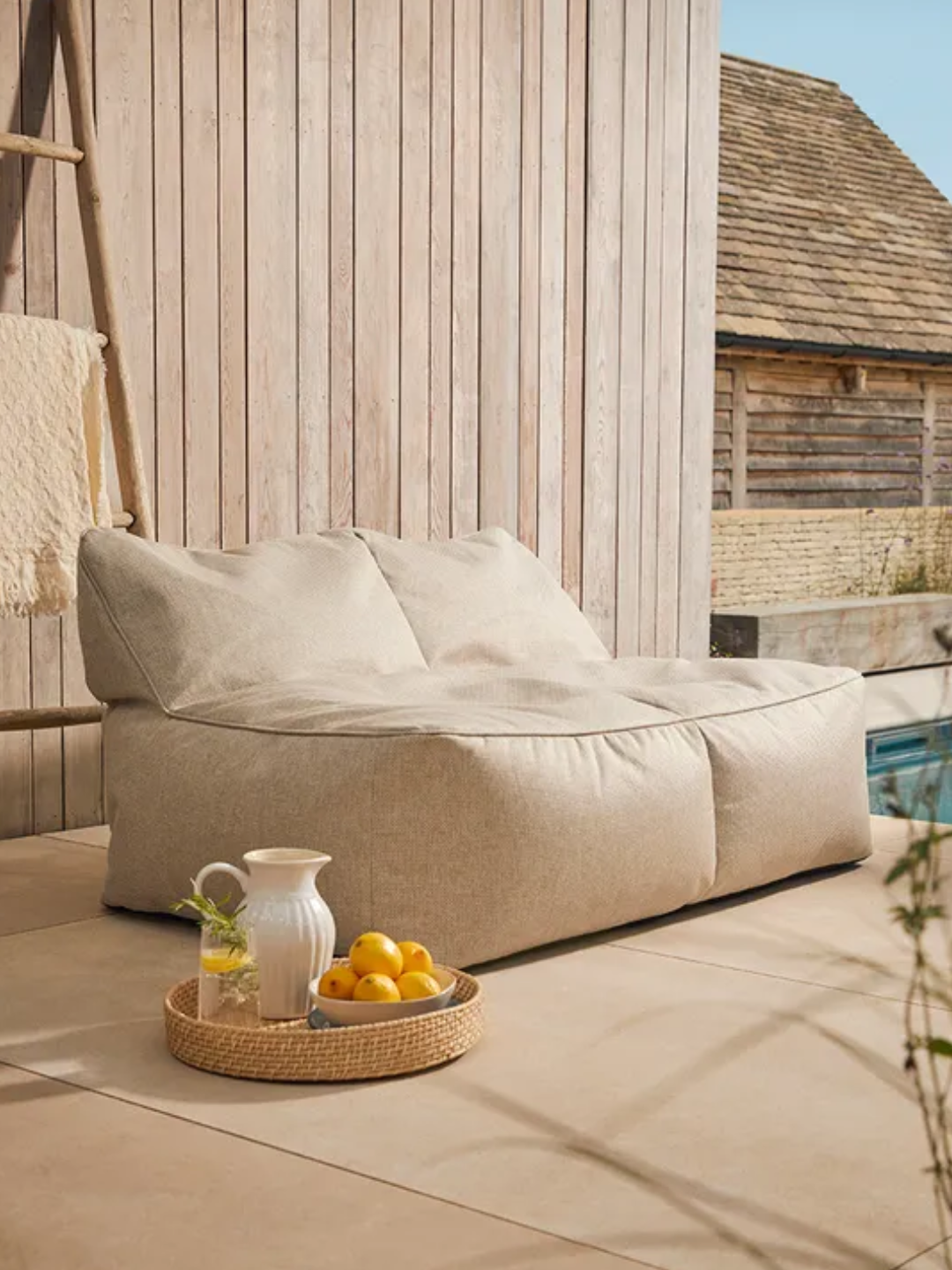 A beige indoor outdoor beanbag from Cox 7 Cox
