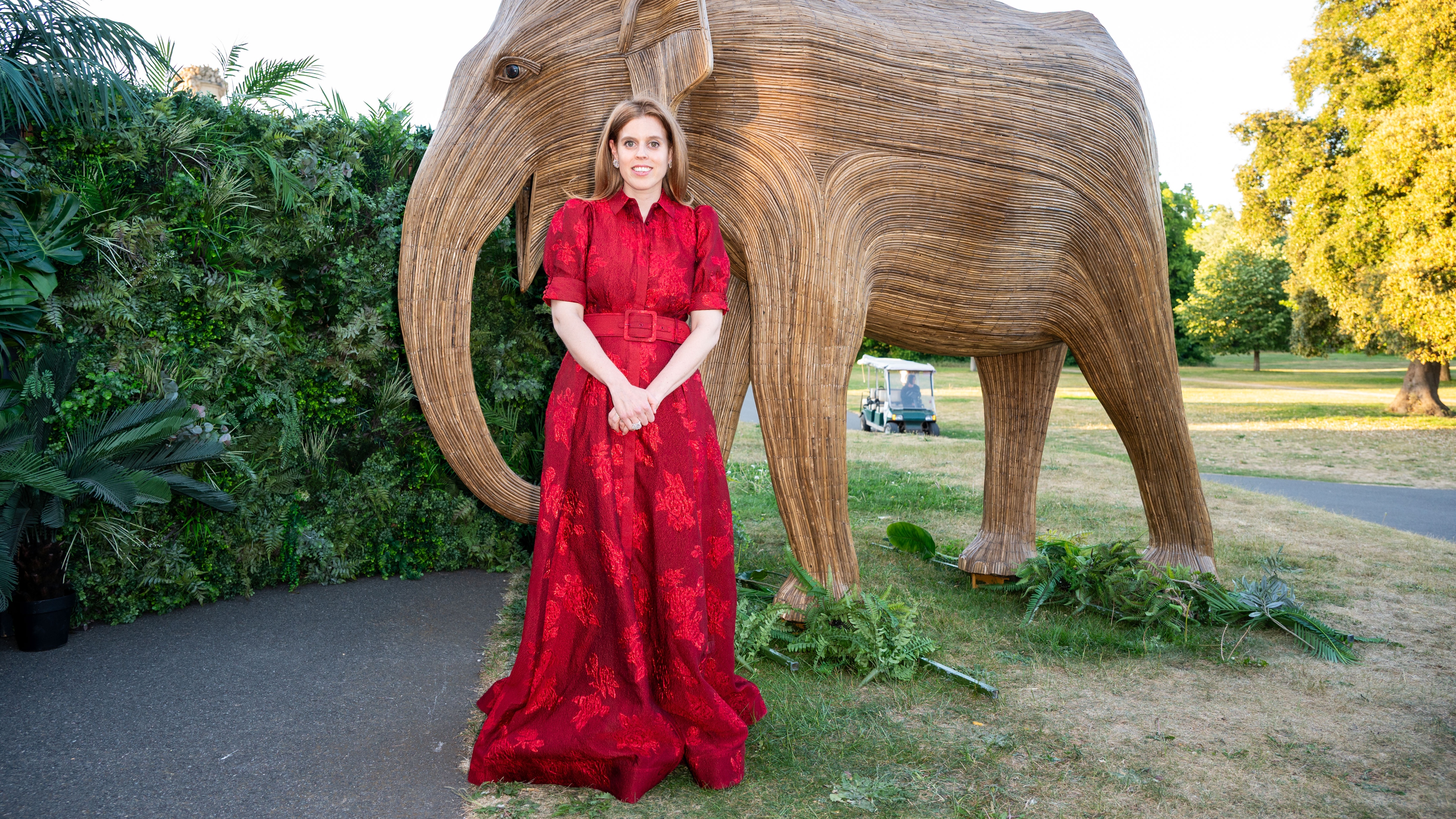 Princess Beatrice stands in front of an elephant sculpture at The Elephant Family Evening of Art and Conservation